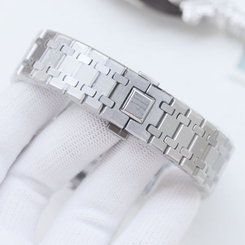 Audemars Piguet Silver Gold Blue Dial Bracelet Watch — detail